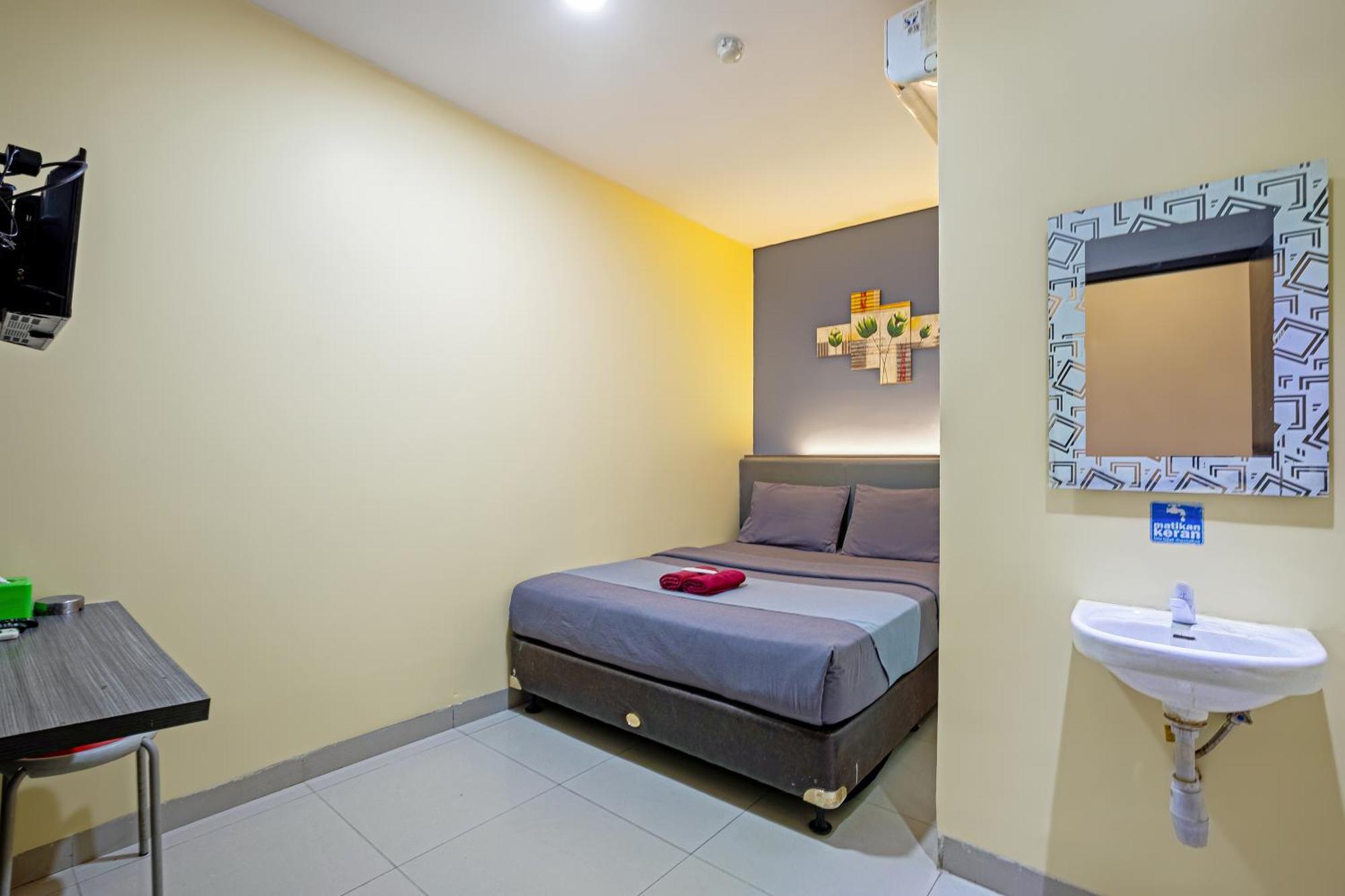 City Biz Residence Jakarta Room photo